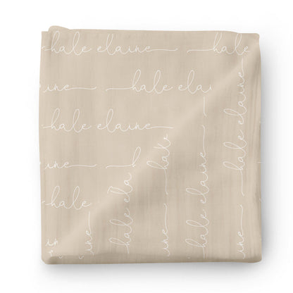 Couverture d’emmaillotage personnalisée avec prénom de bébé